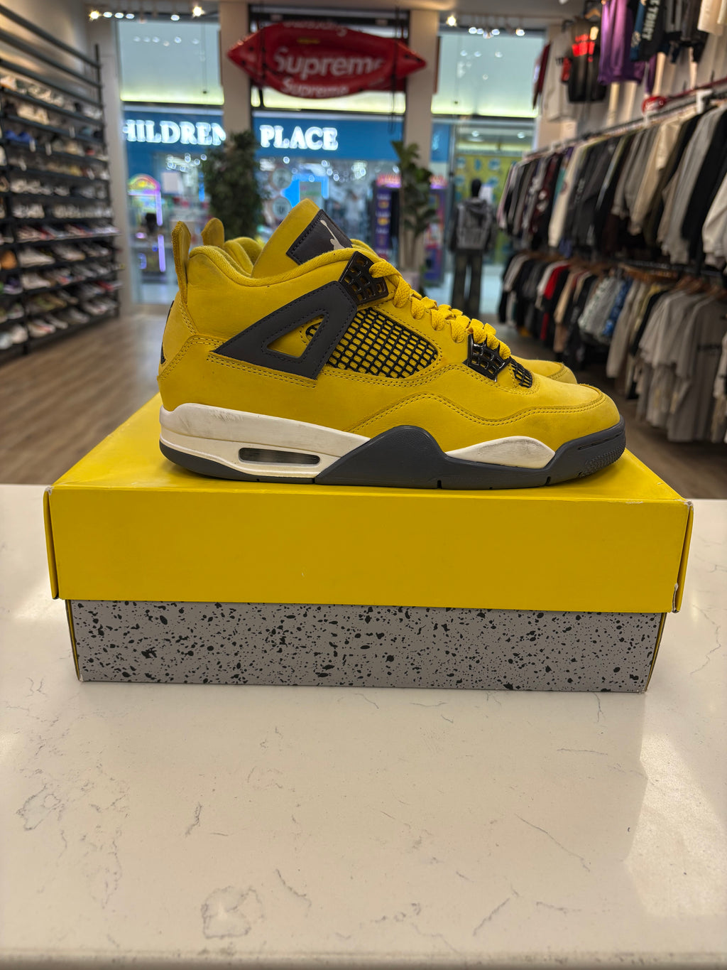 Jordan 4 “Lightning” Preowned Size 8.5