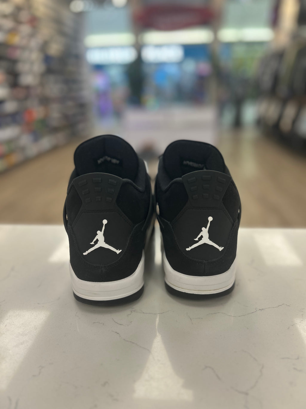 Jordan 4 Retro “White Thunder” Preowned Size 10M