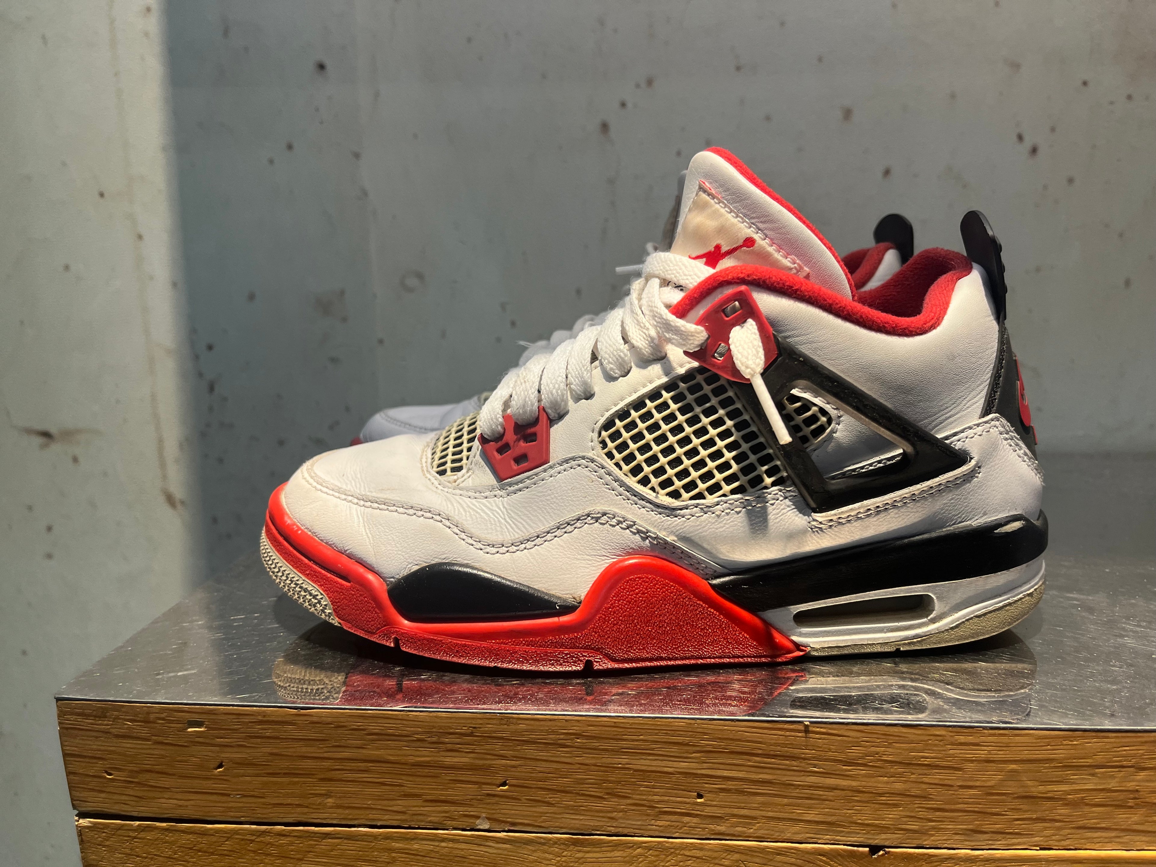 Jordan 4 "Fire Red" Size 5.5y Preowned